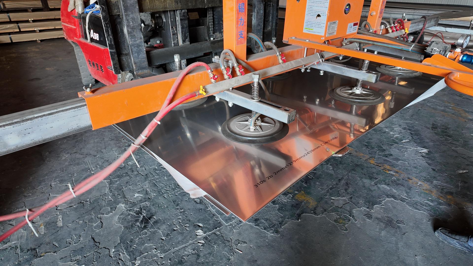 Vacuum suction pads transporting stainless steel sheet